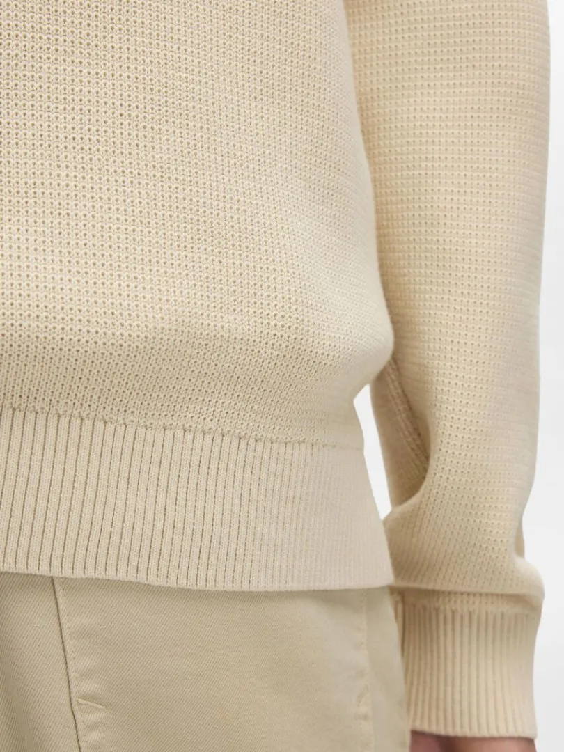 hj_hals_med_lynls_strikke_3-2.webp Strik>SELECTED HØJ HALS MED LYNLÅS STRIKKET CARDIGAN Beige