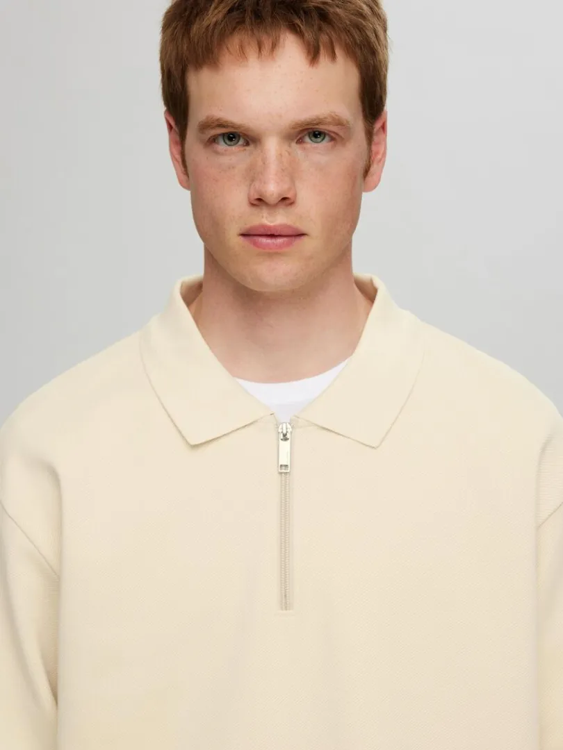 langrmet_sweatshirt_med_l_4-1.webp Poloer>SELECTED LANGÆRMET SWEATSHIRT MED LYNLÅS Beige