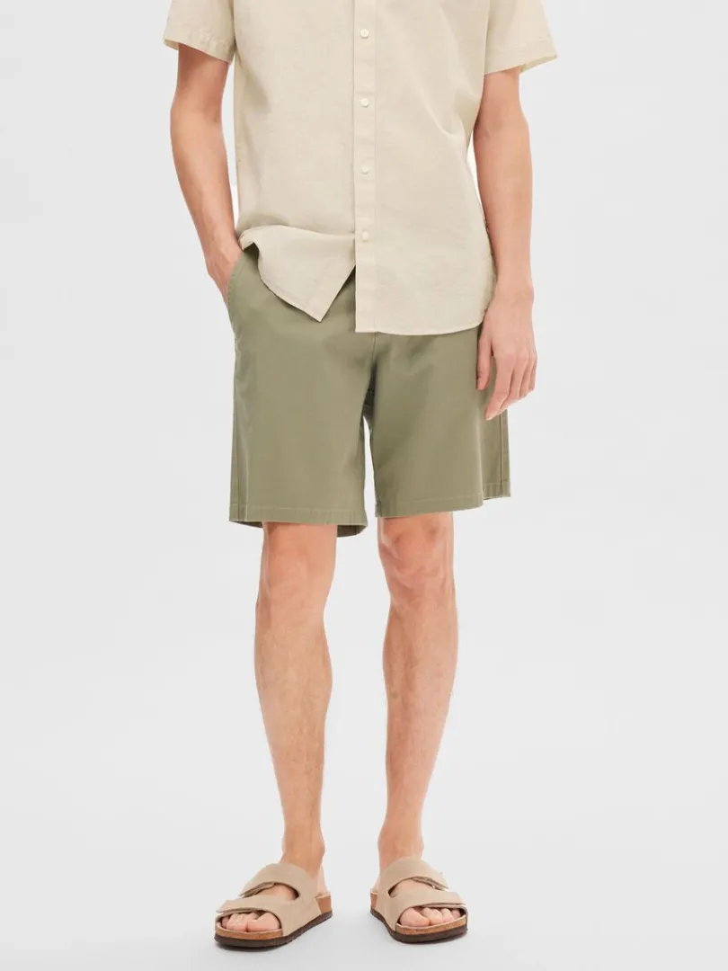 regular_fit_flex_shorts_0.webp Shorts>SELECTED REGULAR FIT FLEX SHORTS Green
